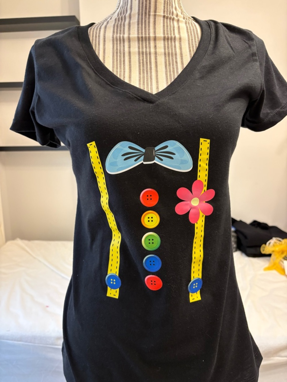 Black Graphic Button & Bow V-Neck Tee
